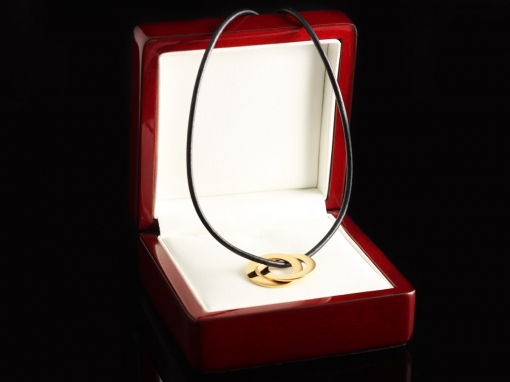 Позолоченный кулон из серебра "Кольца"