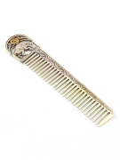 Серебреная расческа Телец