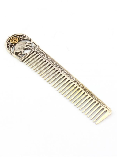 Серебреная расческа Телец